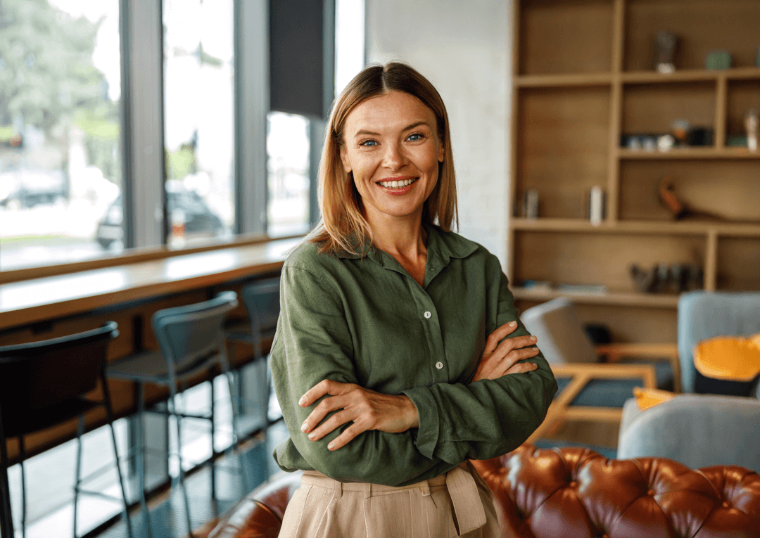 A professional leader or administrator engaged in a thoughtful conversation in an office or meeting setting.